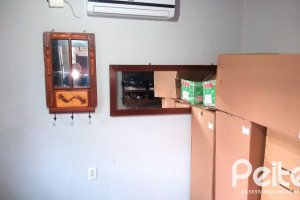 Casa à venda com 180m², 3 dormitórios, 4 vagas, no bairro Ipanema em Porto Alegre