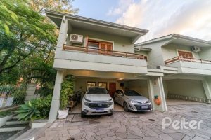 Casa em Condomínio à venda com 170m², 3 dormitórios, 1 suíte, 2 vagas, no bairro Jardim Isabel em Porto Alegre