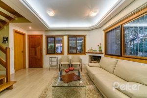 Casa em Condomínio à venda com 170m², 3 dormitórios, 1 suíte, 2 vagas, no bairro Jardim Isabel em Porto Alegre