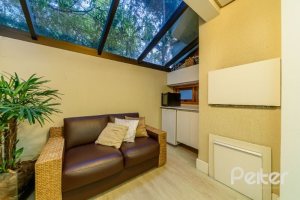 Casa em Condomínio à venda com 170m², 3 dormitórios, 1 suíte, 2 vagas, no bairro Jardim Isabel em Porto Alegre