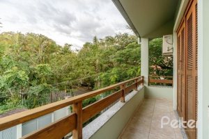 Casa em Condomínio à venda com 170m², 3 dormitórios, 1 suíte, 2 vagas, no bairro Jardim Isabel em Porto Alegre