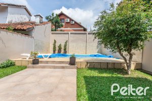 Casa à venda com 379m², 3 dormitórios, 2 suítes, 3 vagas, no bairro Ipanema em Porto Alegre