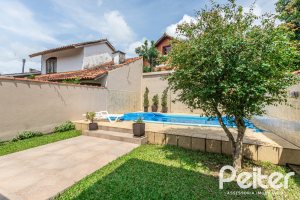 Casa à venda com 379m², 3 dormitórios, 2 suítes, 3 vagas, no bairro Ipanema em Porto Alegre