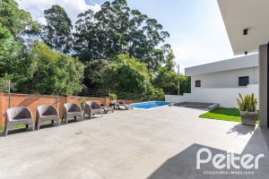 Casa em Condomínio à venda com 344m², 4 dormitórios, 4 suítes, 4 vagas, no bairro Alphaville em PORTO ALEGRE