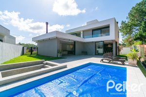 Casa em Condomínio à venda com 344m², 4 dormitórios, 4 suítes, 4 vagas, no bairro Alphaville em PORTO ALEGRE