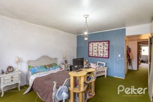 Casa à venda com 246m², 3 dormitórios, 1 suíte, 4 vagas, no bairro Jardim Isabel em Porto Alegre
