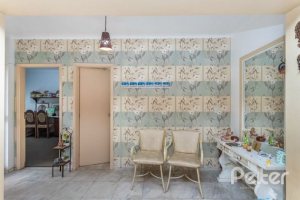 Casa à venda com 246m², 3 dormitórios, 1 suíte, 4 vagas, no bairro Jardim Isabel em Porto Alegre