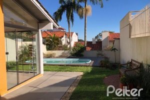 Casa à venda com 208m², 3 dormitórios, 1 suíte, 2 vagas, no bairro Espírito Santo em Porto Alegre