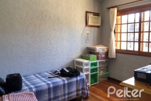 Casa à venda com 208m², 3 dormitórios, 1 suíte, 2 vagas, no bairro Espírito Santo em Porto Alegre