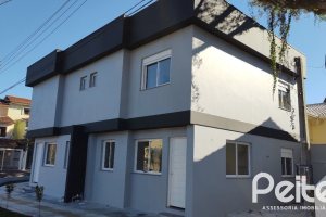 Casa à venda com 88m², 3 dormitórios, 2 suítes, 1 vaga, no bairro Guarujá em Porto Alegre