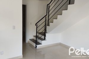 Casa à venda com 88m², 3 dormitórios, 2 suítes, 1 vaga, no bairro Guarujá em Porto Alegre