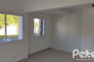 Casa à venda com 88m², 3 dormitórios, 2 suítes, 1 vaga, no bairro Guarujá em Porto Alegre