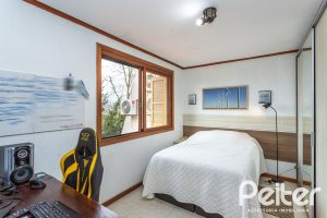Casa em Condomínio à venda com 239m², 3 dormitórios, 3 suítes, 3 vagas, no bairro Santa Tereza em Porto Alegre