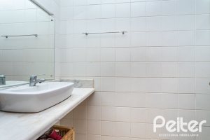 Casa em Condomínio à venda com 239m², 3 dormitórios, 3 suítes, 3 vagas, no bairro Santa Tereza em Porto Alegre