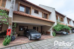 Casa em Condomínio à venda com 239m², 3 dormitórios, 3 suítes, 3 vagas, no bairro Santa Tereza em Porto Alegre