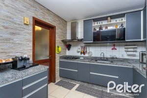 Casa em Condomínio à venda com 239m², 3 dormitórios, 3 suítes, 3 vagas, no bairro Santa Tereza em Porto Alegre