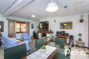 Casa em Condomínio à venda com 239m², 3 dormitórios, 3 suítes, 3 vagas, no bairro Santa Tereza em Porto Alegre