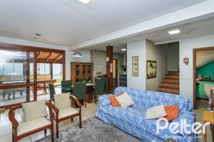 Casa em Condomínio à venda com 239m², 3 dormitórios, 3 suítes, 3 vagas, no bairro Santa Tereza em Porto Alegre