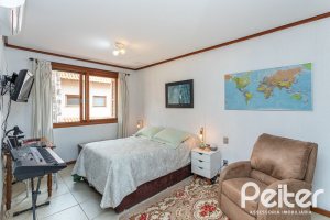 Casa em Condomínio à venda com 239m², 3 dormitórios, 3 suítes, 3 vagas, no bairro Santa Tereza em Porto Alegre