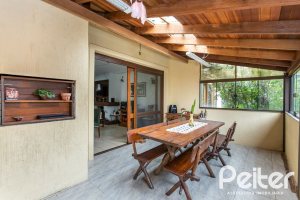 Casa em Condomínio à venda com 239m², 3 dormitórios, 3 suítes, 3 vagas, no bairro Santa Tereza em Porto Alegre