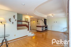 Casa em Condomínio à venda com 216m², 3 dormitórios, 1 suíte, 3 vagas, no bairro Tristeza em Porto Alegre