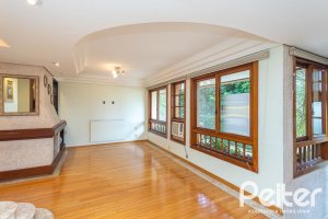 Casa em Condomínio à venda com 216m², 3 dormitórios, 1 suíte, 3 vagas, no bairro Tristeza em Porto Alegre