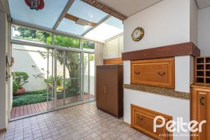 Casa em Condomínio à venda com 216m², 3 dormitórios, 1 suíte, 3 vagas, no bairro Tristeza em Porto Alegre