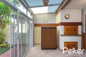 Casa em Condomínio à venda com 216m², 3 dormitórios, 1 suíte, 3 vagas, no bairro Tristeza em Porto Alegre