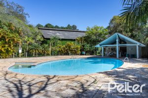 Casa em Condomínio à venda com 294m², 5 dormitórios, 5 suítes, 4 vagas, no bairro Terra Ville em PORTO ALEGRE