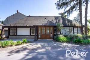 Casa em Condomínio à venda com 294m², 5 dormitórios, 5 suítes, 4 vagas, no bairro Terra Ville em PORTO ALEGRE