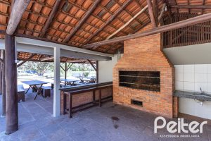 Casa em Condomínio à venda com 294m², 5 dormitórios, 5 suítes, 4 vagas, no bairro Terra Ville em PORTO ALEGRE