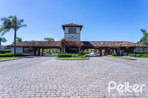 Casa em Condomínio à venda com 294m², 5 dormitórios, 5 suítes, 4 vagas, no bairro Terra Ville em PORTO ALEGRE