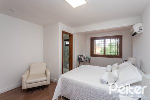 Casa à venda com 410m², 3 dormitórios, 3 suítes, 3 vagas, no bairro Ipanema em Porto Alegre
