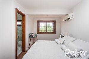 Casa à venda com 410m², 3 dormitórios, 3 suítes, 3 vagas, no bairro Ipanema em Porto Alegre