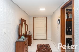 Casa à venda com 410m², 3 dormitórios, 3 suítes, 3 vagas, no bairro Ipanema em Porto Alegre