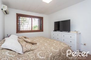 Casa à venda com 410m², 3 dormitórios, 3 suítes, 3 vagas, no bairro Ipanema em Porto Alegre