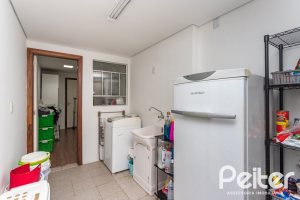 Casa à venda com 410m², 3 dormitórios, 3 suítes, 3 vagas, no bairro Ipanema em Porto Alegre
