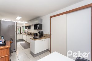 Casa à venda com 410m², 3 dormitórios, 3 suítes, 3 vagas, no bairro Ipanema em Porto Alegre