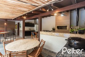Casa à venda com 410m², 3 dormitórios, 3 suítes, 3 vagas, no bairro Ipanema em Porto Alegre