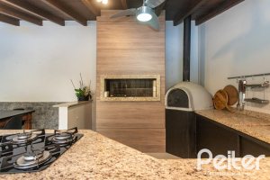 Casa à venda com 410m², 3 dormitórios, 3 suítes, 3 vagas, no bairro Ipanema em Porto Alegre