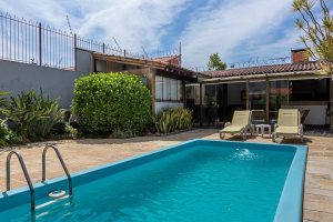 Casa à venda com 410m², 3 dormitórios, 3 suítes, 3 vagas, no bairro Ipanema em Porto Alegre