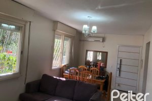 Casa em Condomínio à venda com 150m², 4 dormitórios, 1 suíte, 2 vagas, no bairro Cristal em Porto Alegre