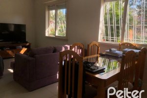 Casa em Condomínio à venda com 150m², 4 dormitórios, 1 suíte, 2 vagas, no bairro Cristal em Porto Alegre