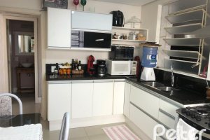 Casa em Condomínio à venda com 150m², 4 dormitórios, 1 suíte, 2 vagas, no bairro Cristal em Porto Alegre