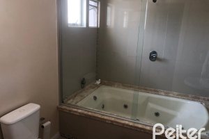 Casa em Condomínio à venda com 150m², 4 dormitórios, 1 suíte, 2 vagas, no bairro Cristal em Porto Alegre