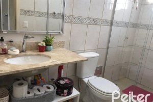 Casa em Condomínio à venda com 150m², 4 dormitórios, 1 suíte, 2 vagas, no bairro Cristal em Porto Alegre