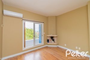 Casa à venda com 297m², 4 dormitórios, 2 suítes, 3 vagas, no bairro Tristeza em Porto Alegre