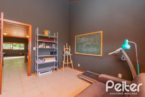 Casa à venda com 297m², 4 dormitórios, 2 suítes, 3 vagas, no bairro Tristeza em Porto Alegre