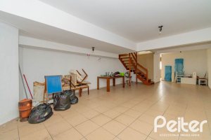 Casa à venda com 297m², 4 dormitórios, 2 suítes, 3 vagas, no bairro Tristeza em Porto Alegre