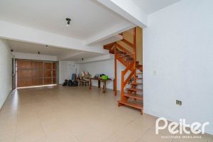 Casa à venda com 297m², 4 dormitórios, 2 suítes, 3 vagas, no bairro Tristeza em Porto Alegre